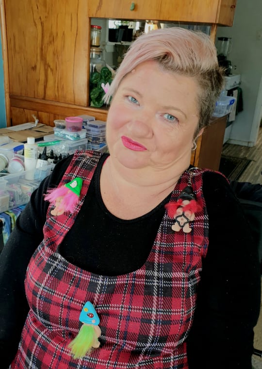 NZ Artist Jennifer Sosich Showcasing her naughty gnome brooches, created by mouth